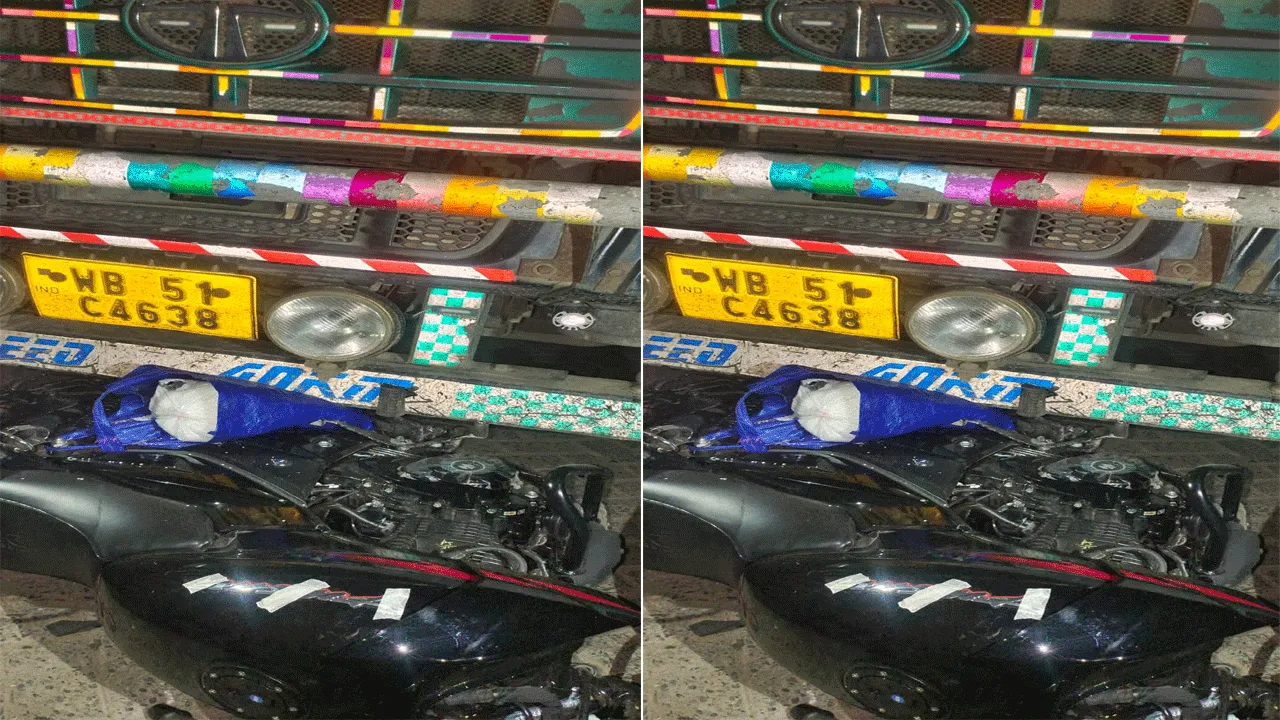 লরির তলায় ঢুকে গেল বাইক, অল্পের জন্য প্রাণে বাঁচলেন যুবক ও তাঁর ভাইজি