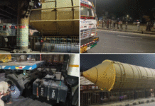 বিশাল যন্ত্রাংশ নিয়ে উড়ালপুলের নিচে আটকে গেল ট্রেলার